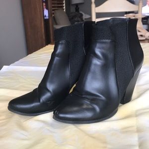 Black leather heeled boots